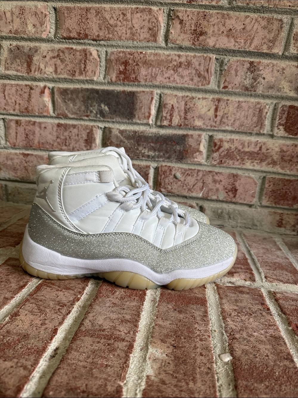 Womens Jordan 11 retro “white metallic”sneakers size 7